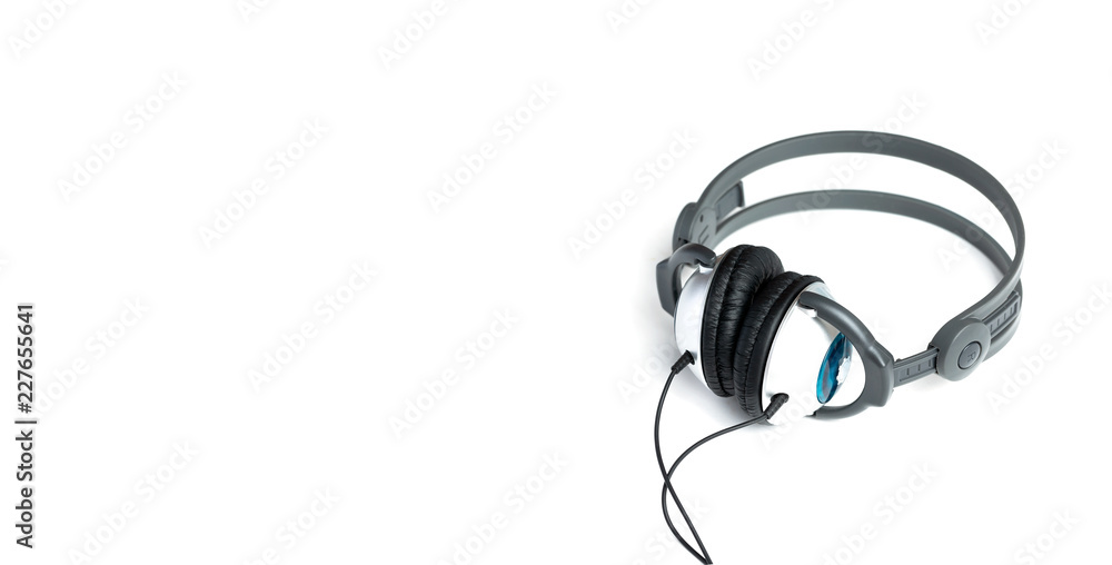 Kids headphones in gray and black on white background. learning foreign languages. Panoramic. Kids headphones in gray and black on white background. learning foreign languages. Panoramic.