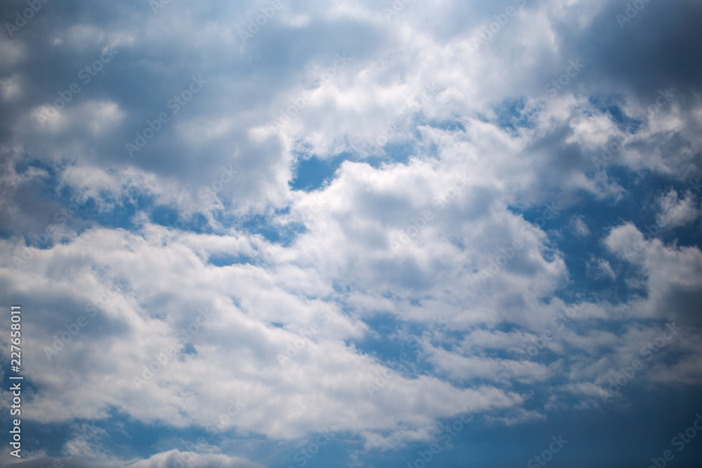 Blue sky with clouds background