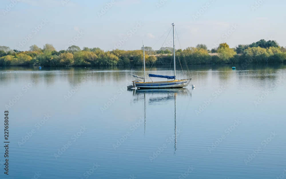 Sail boat moored at Fairlop Waters, Essex.
