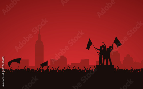 Silhouette group of people raised fist and flags protest in city with red color sky background photo