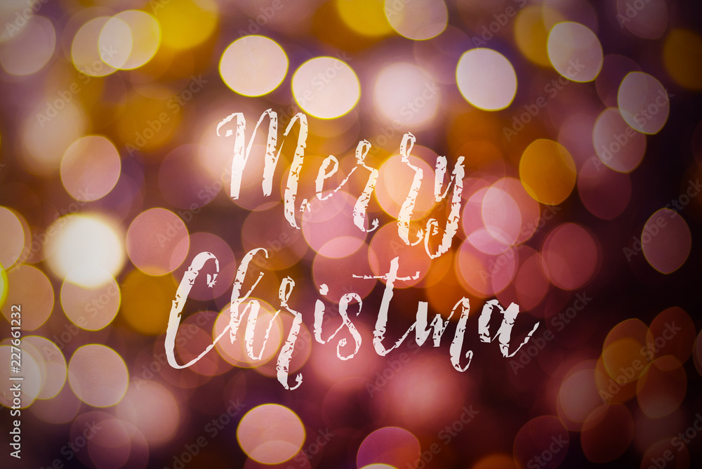 Naklejka premium Merry Christmas and New Year typographical on pink gold sparkle bokeh or defocus with Xmas card text