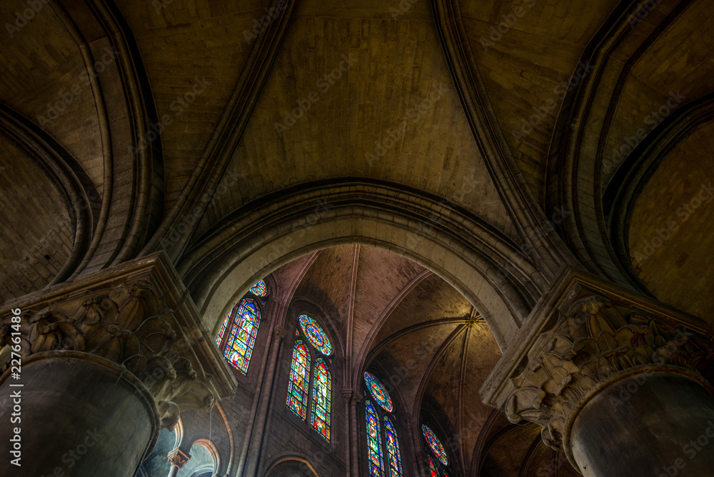 Interior view of Notre-Dame Cathedral, French Gothic architecture in Paris.