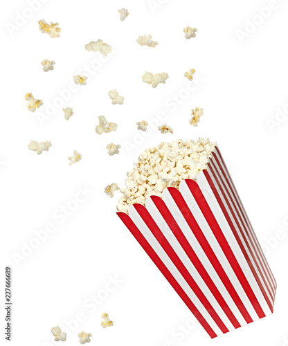 Falling popcorns in stripped box isolated on white background