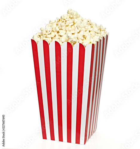 Popcorn in striped paper or carton bucket isolated on white background