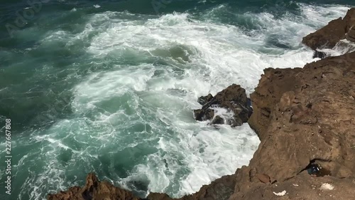 Short Take of Waves Crashing on the Rocks photo