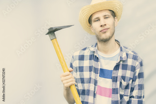 isolated man holding garden equipment tools with copy space f