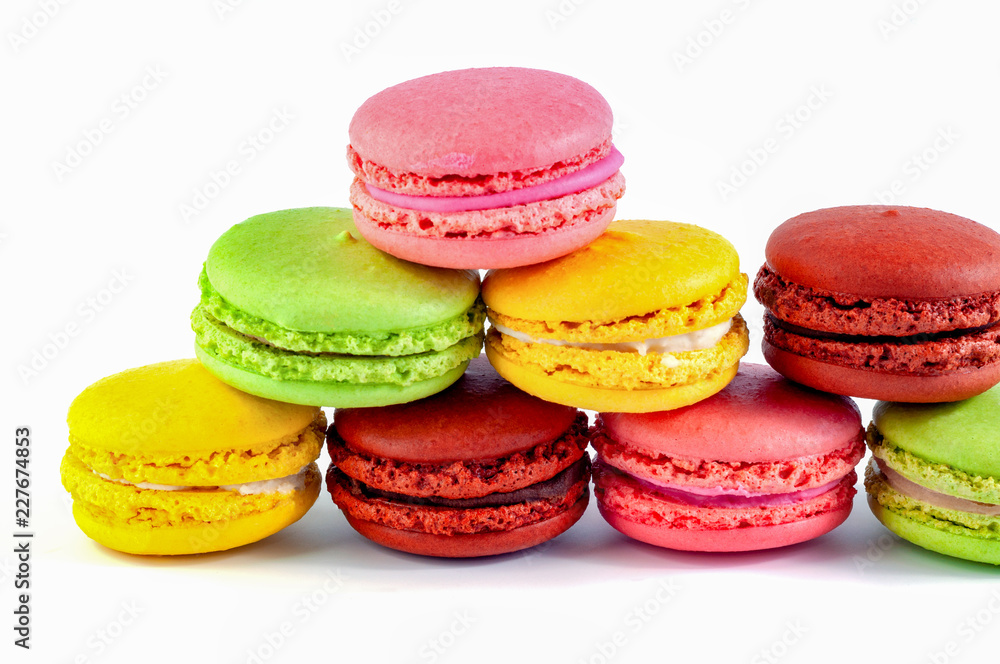 Macaron cakes of different colors on a white background Macaron cakes of different colors on a white background