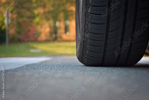 Wallpaper Mural a tire of car on the road Torontodigital.ca