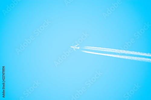 Plane in the blue sky