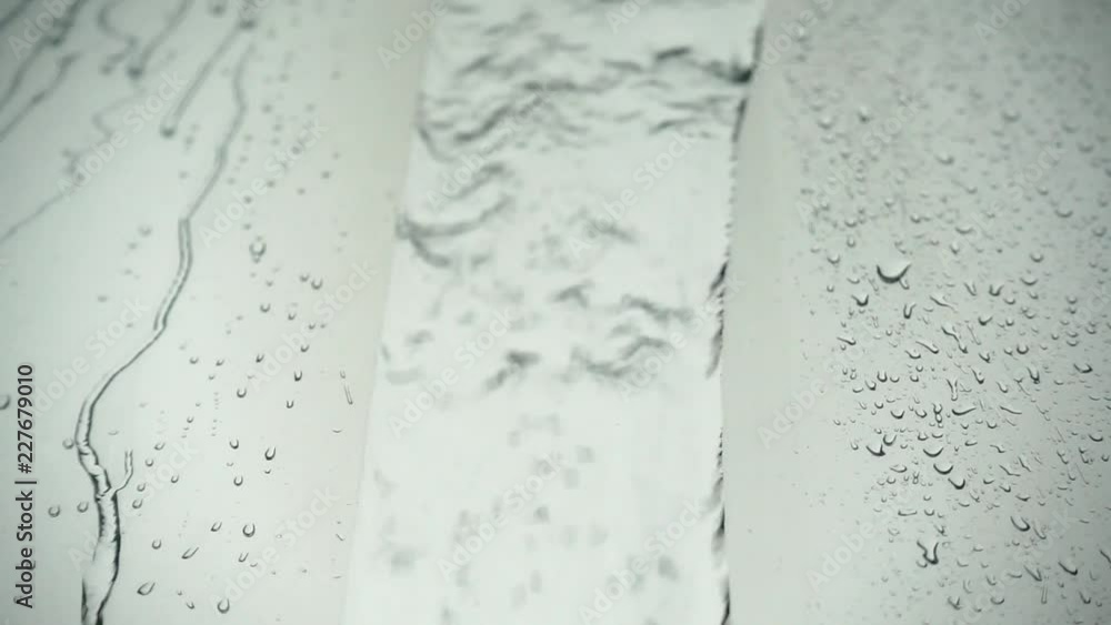 HD 1080p super slow rain drops on glass texture and backgound HD 1080p super slow rain drops on glass texture and backgound