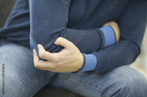 elbow joint pain in a man