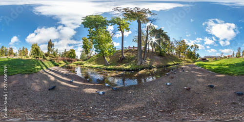 full seamless spherical panorama 360 by 180 degrees angle view on the shore of small river with ducks in city park in summer day in equirectangular projection, AR VR virtual reality content