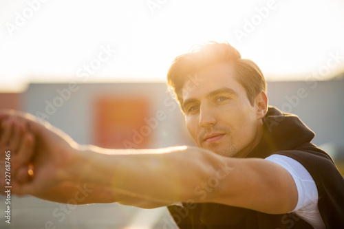 Young man exercising outdoors 