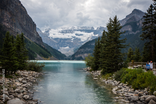 View of Lake Louise in Banff National Park on a cloudy overcast day in Canada