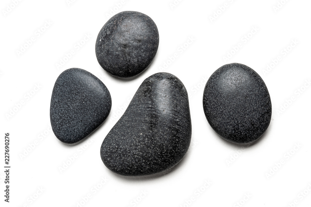 Four big black pebbles - obrazy, fototapety, plakaty 