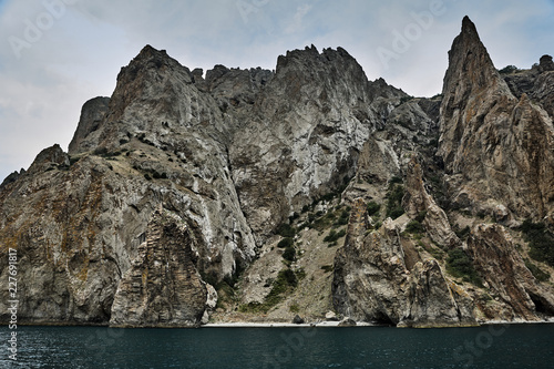 Russia. Crimea. Koktebel. Karadag. Barakhta Bay. On the left is the Strizhevaya rock, on the right - the Elephant Cape