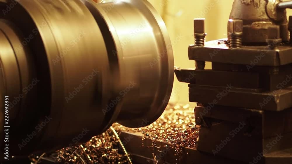 Working process at the machine at engineering plant. The mechanism is ...