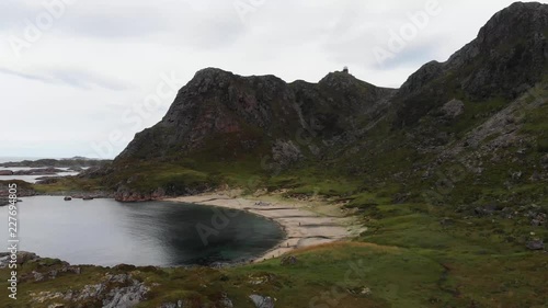 Melkarst√∏a beach near a fishing village, St√∏, located on the northern tip of the island of Lang√∏ya, along the Gavlfjorden in the Vester√•len archipelago. photo