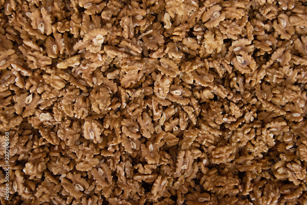 Background of walnuts close up. kernels of peeled nuts Background of walnuts close up. kernels of peeled nuts