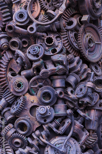 Steampunk background  machine parts  large gears and chains from machines and tractors.