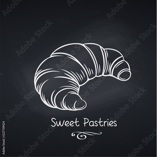 croissant on chalkboard