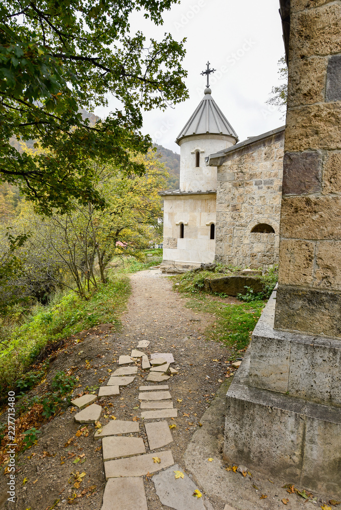 Beautiful Armenian monastery Haghartsin in the autumn forest. Beautiful Armenian monastery Haghartsin in the autumn forest.