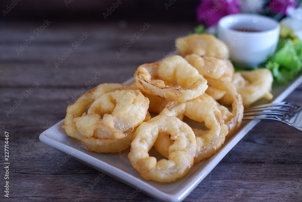 onion ring on old wooden onion ring on old wooden