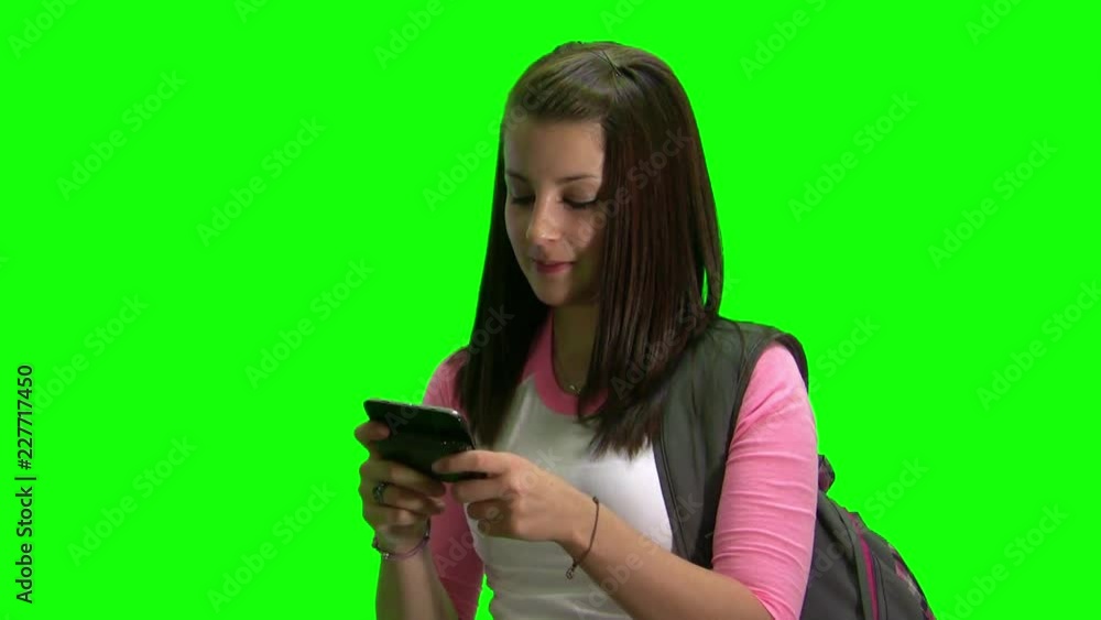 Teenage Girl Texting on a Cell Phone Teenage Girl Texting on a Cell Phone