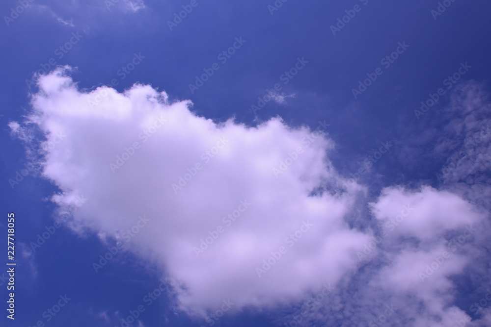 White clounds on blue sky background,use for backdrop or web design,soft focus.