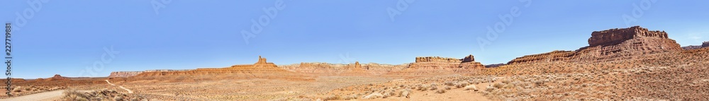 Panoramic view of the Valley of the Gods at Utah desert on a sunny day.