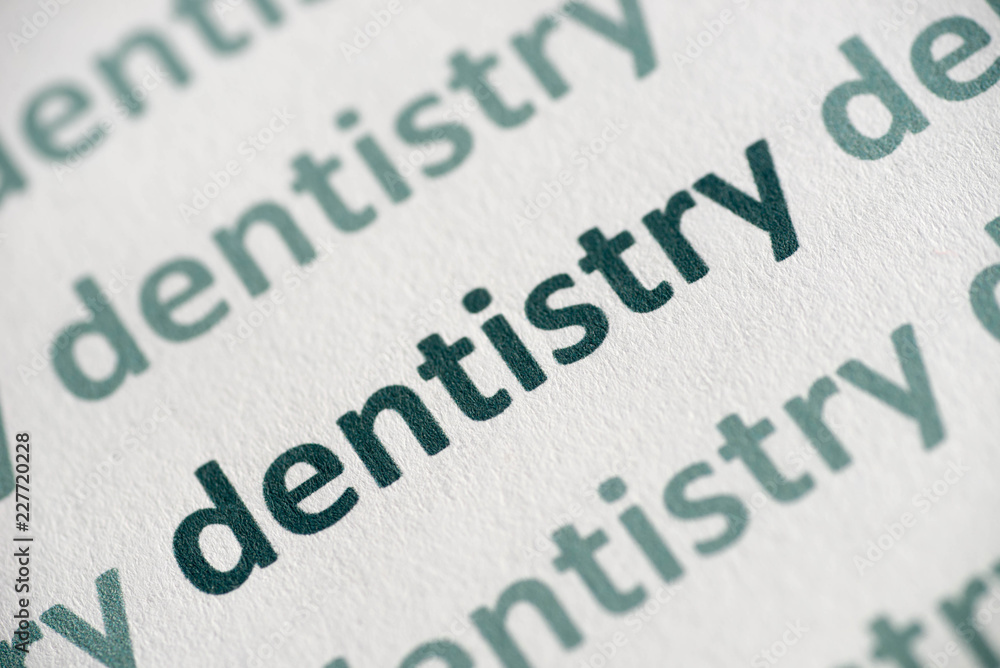 word dentistry  printed on  paper macro