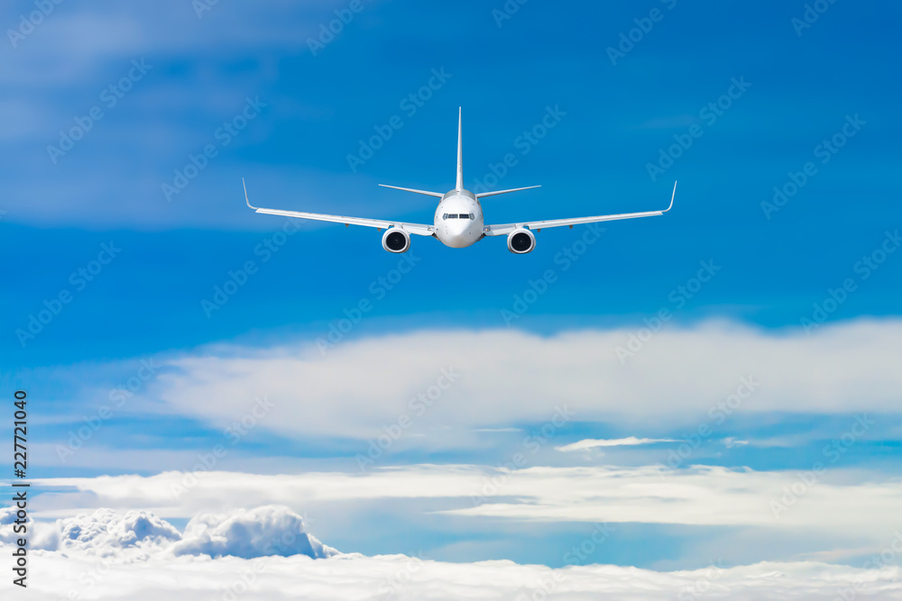 White airplane flying above cloud White airplane flying above cloud