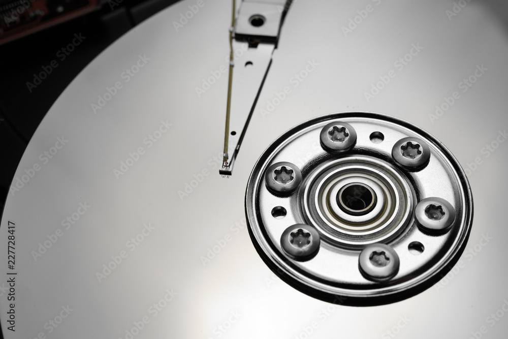 Close up of hard disk's internal mechanism hardware Close up of hard disk's internal mechanism hardware
