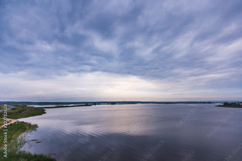 view of the spill of the Volga from the high bank in cloudy weather