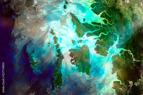 Mergui Archipelago. River delta of the Irrawady, a river that flows from north to south through Myanmar. Elements of this image furnished by NASA.