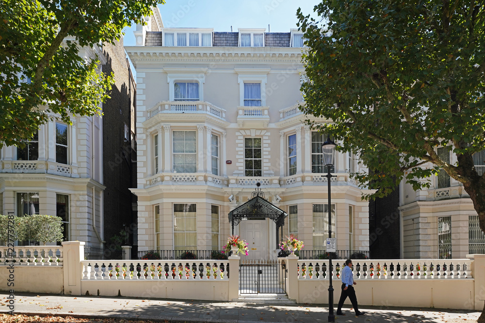 London/UK - August 2018: A premier street in Kensington, Holland Park. A terrace of multimillion pound luxurious villas, celebrity homes as well as homes of multimillionaires and billionaires. 