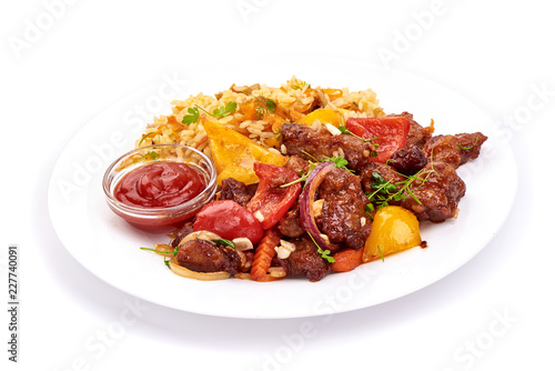 Roast Sweet and Sour Pork with vegetables with rice and sauce, Chinese recipes WOK. Isolated on white background