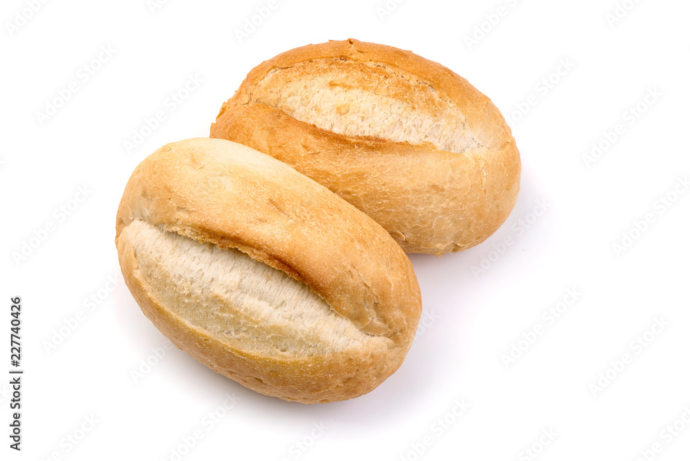 Freshly baked crispy bread rolls, close-up, isolated on a white background.