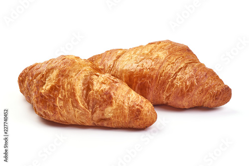 Traditional croissants, close-up, isolated on a white background.