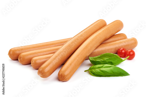 Fresh Oktoberfest Sausages with basil leaves and Physalia berry, isolated on a white background. photo