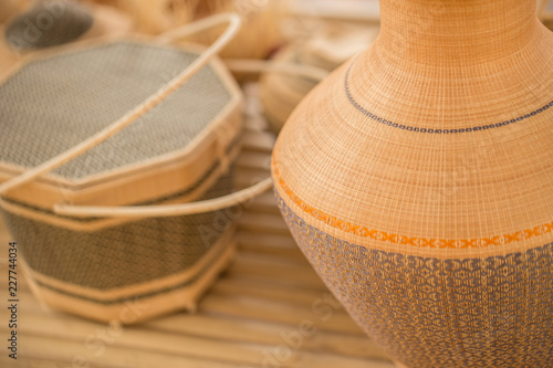 Thai OTOP product from dry Hygaliepa grass weave as basketry. photo