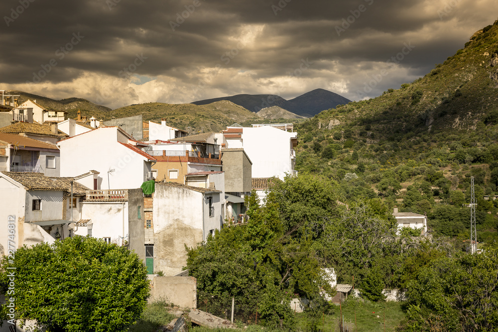 a view of Quentar town on a cloudy day, province of Granada, Andalusia, Spain