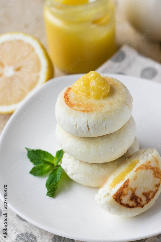 Cheesecakes on rice flour with lemon kurd for breakfast Cheesecakes on rice flour with lemon kurd for breakfast