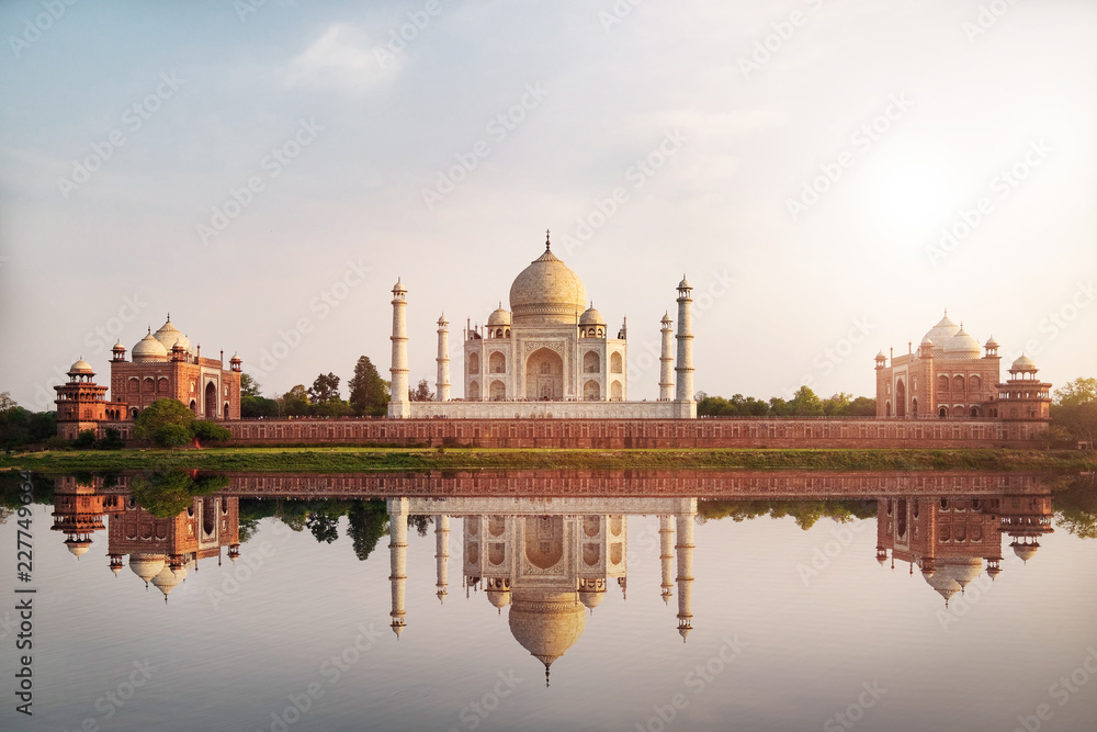 Sun set at Taj Mahal seen from Mehtab Bagh reflect on Yamuna river, an ivory-white marble mausoleum on the south bank of the Yamuna river in Agra, Uttar Pradesh, India.