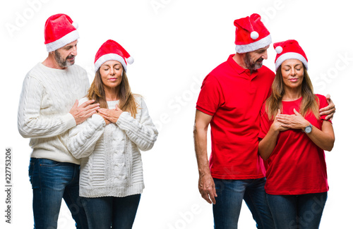 Collage of middle age mature beautiful couple wearing christmas hat over white isolated background smiling with hands on chest with closed eyes and grateful gesture on face. Health concept.