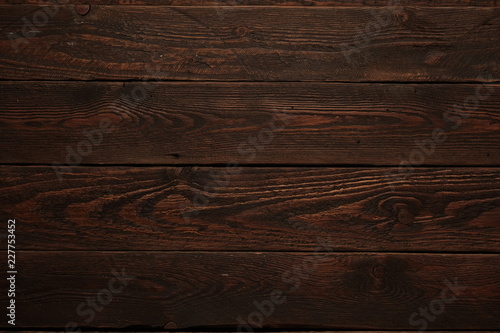 Abstract textured background.  Top view dark wood table 