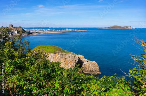 Landscape with harbor of Howth near Dublin, in the background the island Irelands Eye, Ireland