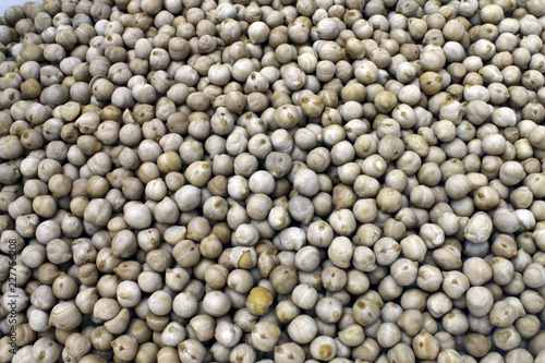 Appetizing chickpeas piled on a tray ready to cook