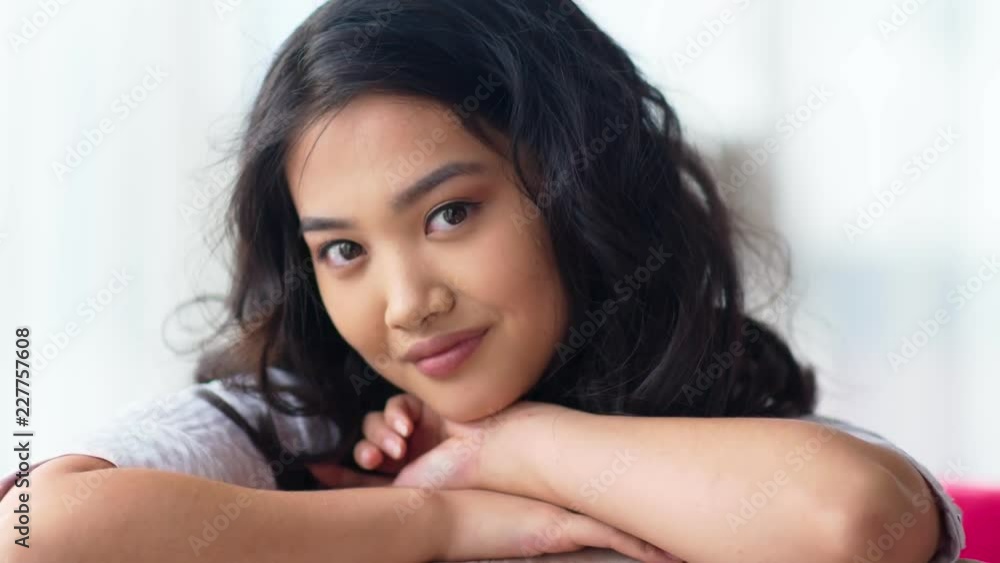 Close-up portrait of pretty Asian young woman with perfect clear skin and natural makeup Close-up portrait of pretty Asian young woman with perfect clear skin and natural makeup