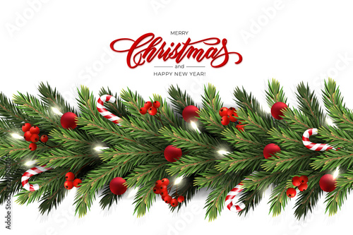 Holiday's Background for Merry Christmas greeting card with a realistic garland of pine tree branches, decorated with Christmas balls, Candy Canes, red berries. Lettering Merry Christmas photo